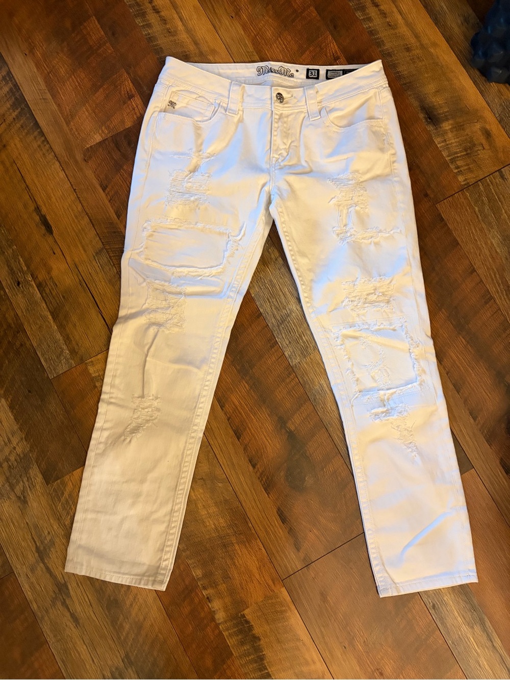 Miss Me very distressed jeans.